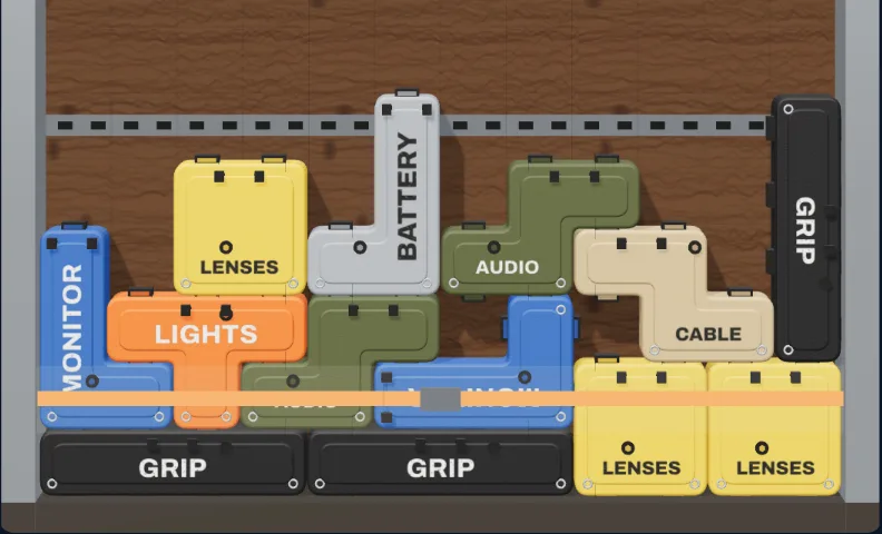 Hard cases stacked in a truck in the Load Out game